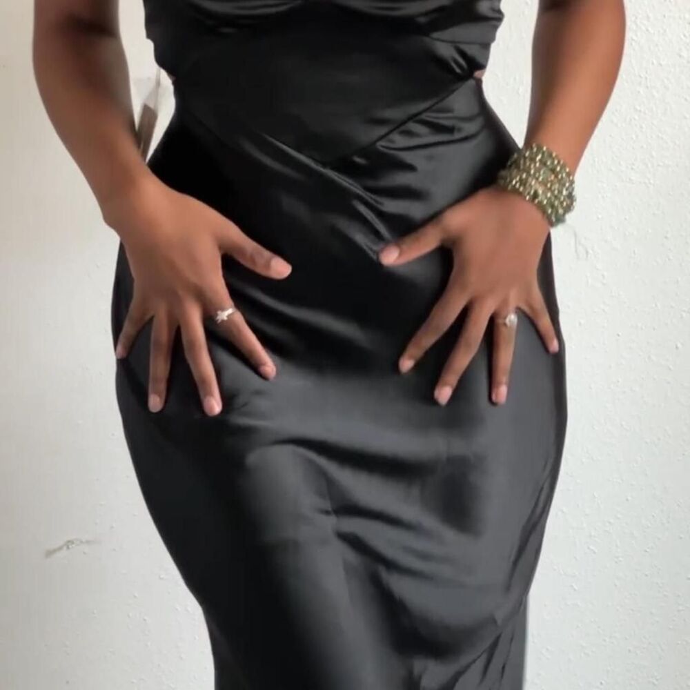 black satin midi slip dress with open back